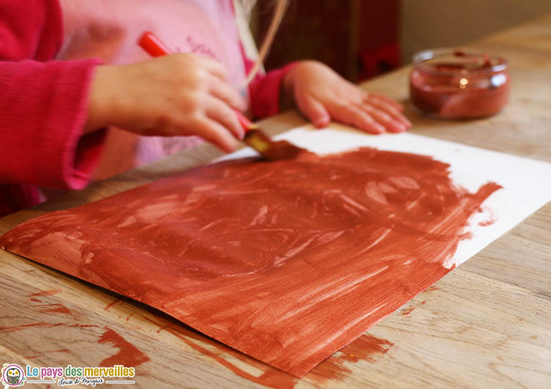 Peinture marron sur une feuille blanche Canson