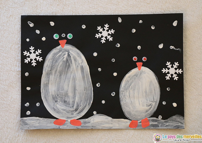 Art visuel : les pingouins dans la neige la nuit